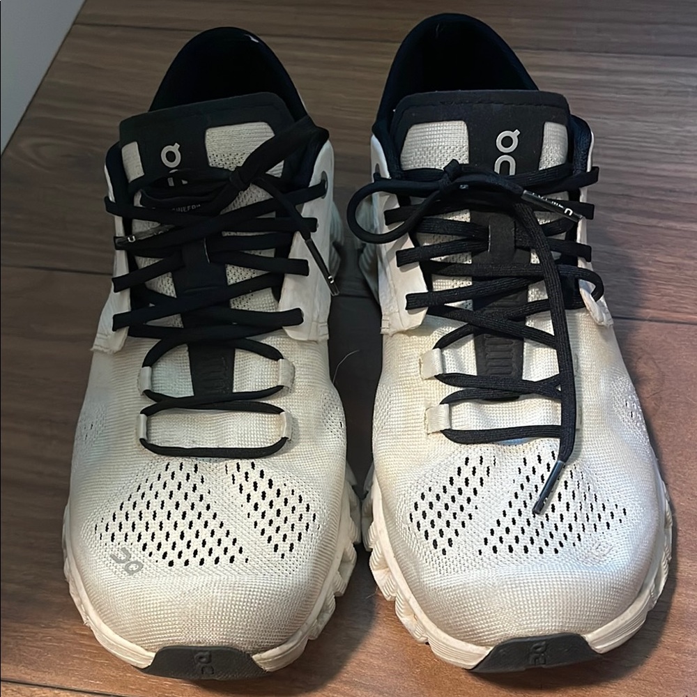 On Running Black and White Athletic Shoes with Mesh Design